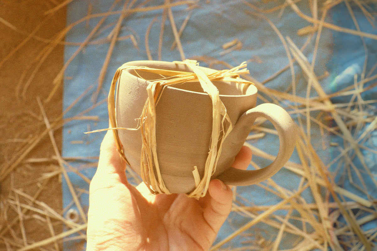 Artisan hand-finishing process on a Haremono Bizen ware piece