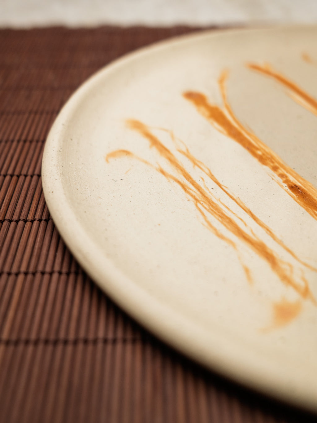 Modern table setting with handmade ceramic plate