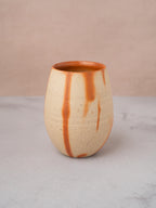 Modern unglazed ceramic cup with Hidasuki patterns