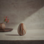 Handmade Bizen ware ceramic bud vase in natural setting